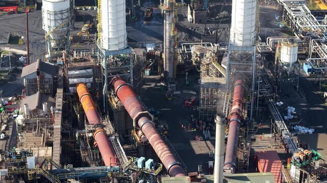 Aerial view of petrochemical Humber Refinery coking furnaces and industrial pipe network Immingham UK