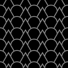 Fish scale wallpaper. Asian traditional ornament with repeated scallops. Repeated white triangular and circular shapes on black background. Seamless surface pattern design with scales. Squama motif. © funkyplayer