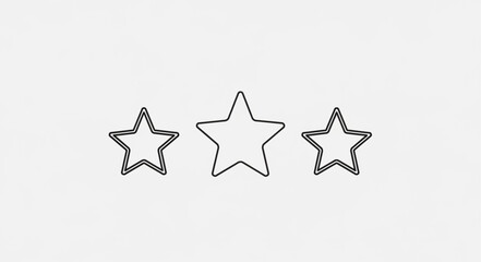 Obraz premium Three hand drawn stars on a white background.