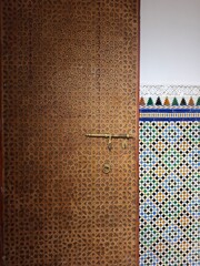 Traditional Moroccan Hand-Carved Wooden Door with Intricate Geometric Patterns