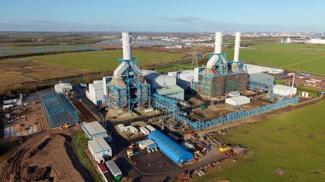 Aerial view of South Humber Bank Power Station with chimney scaffolding UK