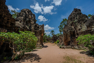 Naklejka premium Ancient stone ruins and trees at Prasat Prei temple in Cambodia