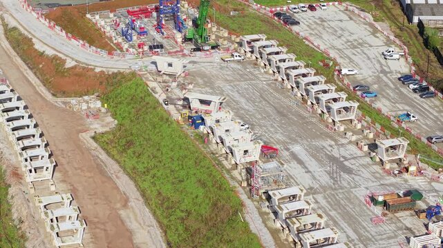 Aerial view of major HS2 rail construction works in Birmingham featuring rows of precast concrete castings for civil engineering in the UK