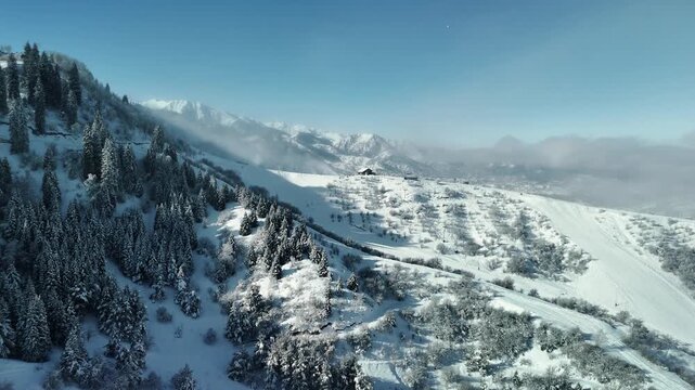 Aerial view of mountain valley with snow