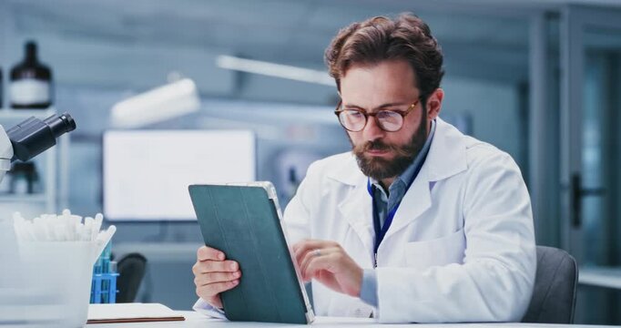 Paperwork, science and man on tablet in lab for online research, medical review or experiment results. Healthcare, pharmaceutical and person on tech for clinical study, trial and medicine development
