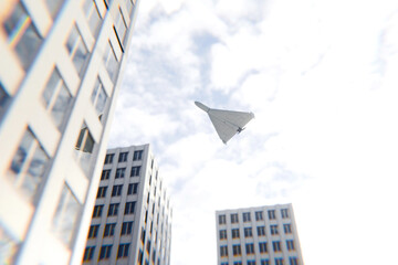 An Iranian military drone, the kamikaze shaheed, flies near modern high-rise buildings in the city. War and aerial weapons