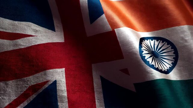 british flag waving next to indian flag. relations between great britain and india