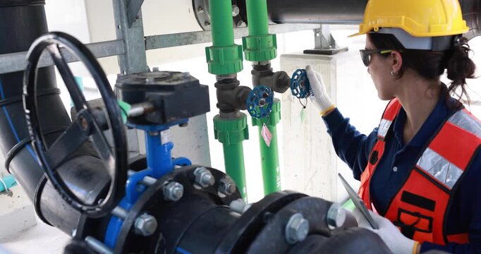 Female engineer finish and success in working on checking and maintenance equipment at industry solar rooftop power 