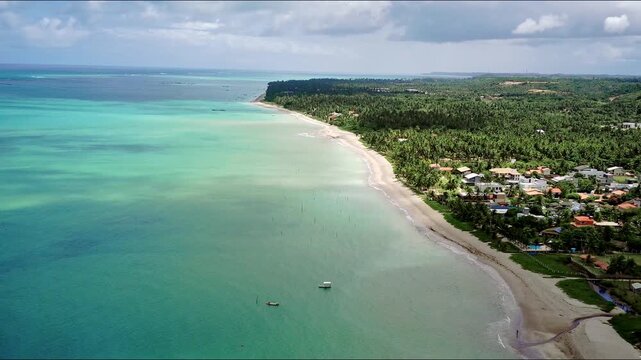 Aerial view of the Alagoas skyline with a paradisiacal turquoise ocean