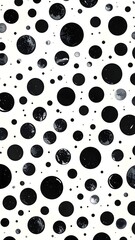 Fototapeta premium Black circular blotches of various sizes are scattered across a white background, creating a pattern. The circles display a mottled texture