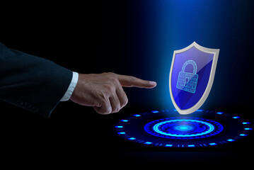 Man holding glowing cyber security shield guard blue. Digital cybersecurity and protection concept. Data security system, Anti hack defense, Preventing data theft, Malware and Virus attack protection © bigjom