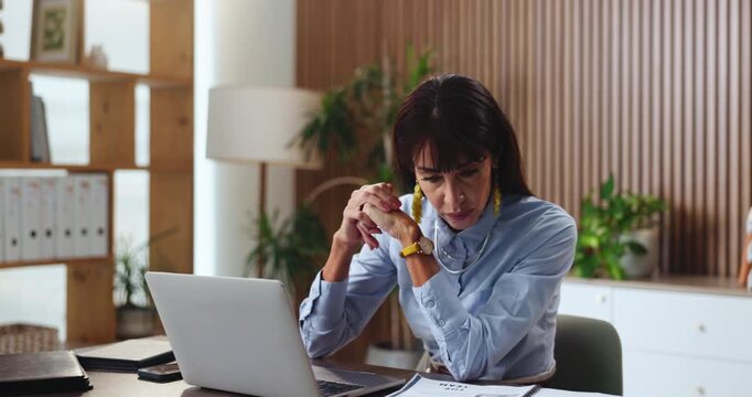 Laptop, reading and documents with business woman in office for account, budget and planning. Market research, online report and paperwork with mature employee for revenue, profit and funding