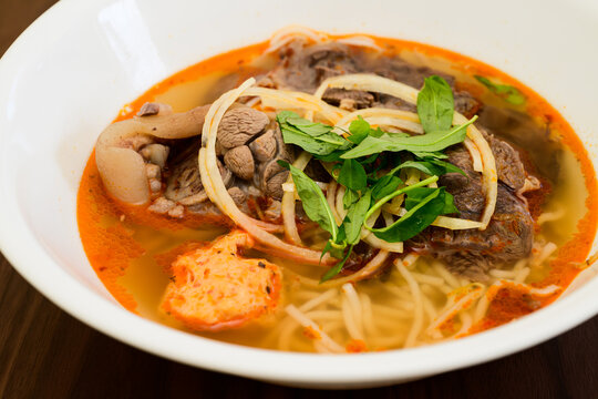 Bun Bo Hue Vietnamese Beef noodle soup. Close up
