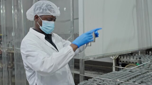 Quality control action in food processing industry factory setting visual documentation detailed inspection process