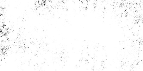 Obraz premium Black and white grunge texture, heavy grit and distressed stipple effect, sparse ink splatter on a stark white background and scratch wall design. minimalist abstract noise, grainy photocopy texture. 
