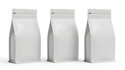 Three plain white stand-up coffee or tea packaging pouches arranged neatly in a row