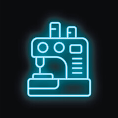 Fototapeta premium Blue neon icon of a sewing machine glowing on a dark background