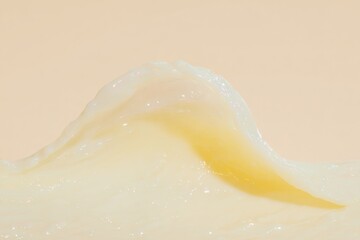 Obraz premium Splash of fresh milk and cream forming a wavy fluid motion for dairy food advertising and healthy beverage marketing background with copy space on soft yellow