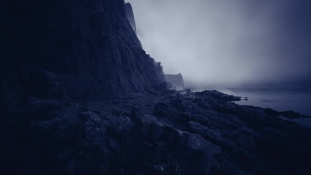 dark rocky coastline shrouded in fog, deep blue tones, jagged basalt cliffs towering over shadowed shore, still water reflecting textured rock, cinematic moody