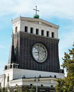 Troja Castle with a clock, a church in Vinohrady