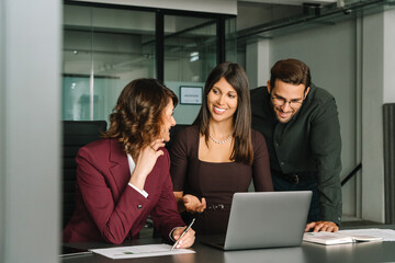 Young woman manager showing finance project online, doing training to job coworkers, colleagues....