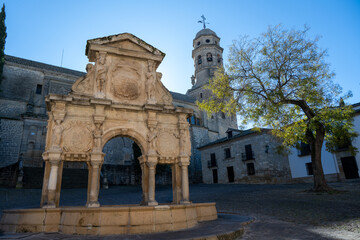 Obraz premium Historic plaza fountain and cathedral tower, Baeza, Andalusia, Spain