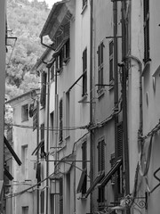 Naklejka premium Row Houses, Portovenere, Italy. row houses and hanging laundry in the fishing village of Portovenere, on Italy's west coast.
