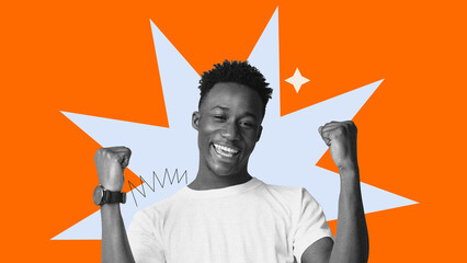 A young man stands smiling with arms raised in celebration. The background features bright colors and bold shapes. This moment captures happiness and enthusiasm in a creative design. © Prostock-studio