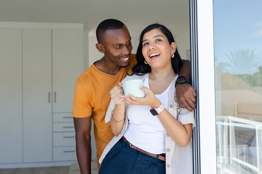 Square folding, diagonal corners meeting on paper, crease showing, labeling 2cm, 4cm, fold mark