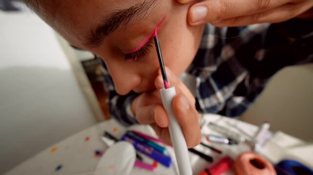 Meticulous pink eyeliner tutorial closeup application