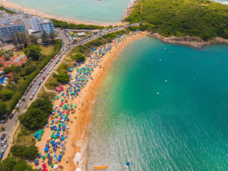 Fototapeta premium Aerial view of Enseada Azul beaches in Guarapari Espírito Santo Brazil during summer tourism season