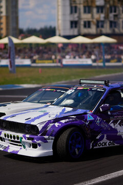 Kyiv, Ukraine, Chaika Raceway - August 3, 2023: Drift car in a race with smoke. Drift car close-up. Drift cars and drivers, street racing, auto culture. Drift culture.