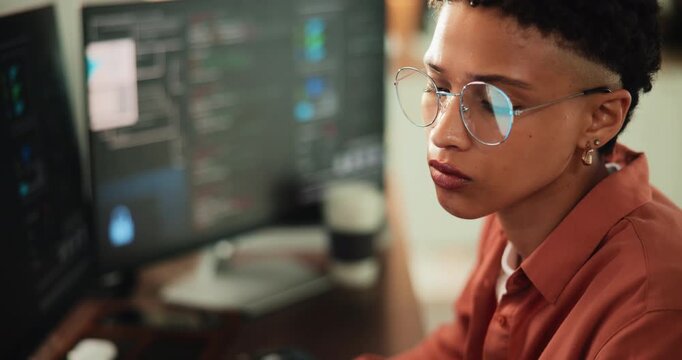 Woman, reading and computer for programming in office with research, software manual and coding. Female person, developer and troubleshooting server with pc, website maintenance and debugging system