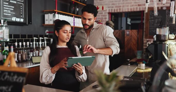 Discussion, people or entrepreneur with tablet in coffee shop, planning supply order or online shopping. Hospitality industry, cafe inventory or couple with tech for ecommerce, teamwork or speaking