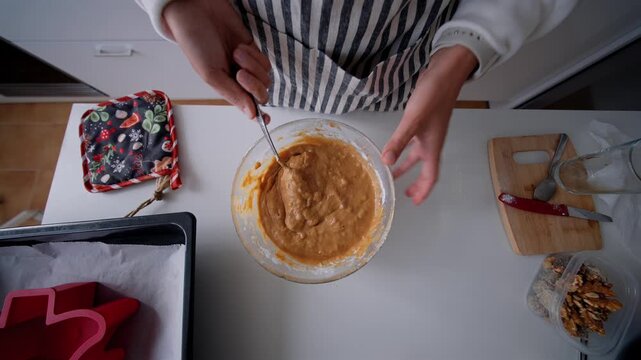Kitchen setting with ingredients and tools for baking cookies