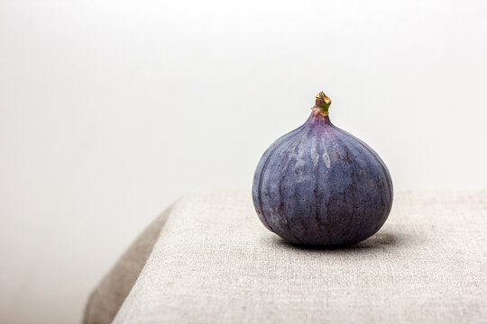 Fresh fig on a light background.