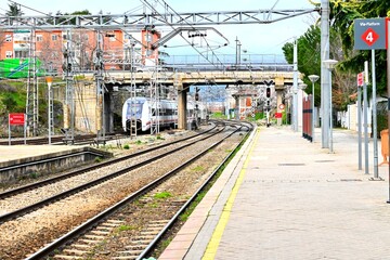 Naklejka premium Railway track at Collado Villalba station, Madrid, Spain. March 03,2026