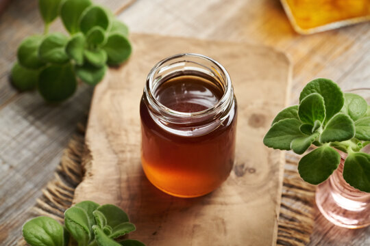 A jar of Coleus amboinicus syrup for common cold