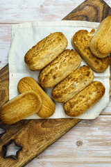 Naklejka premium Polvorones and mantecados, traditional Christmas cakes from Andalusia, Spain, on wooden background, view from above. Copy space