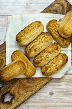 Polvorones and mantecados, traditional Christmas cakes from Andalusia, Spain, on wooden background, view from above. Copy space