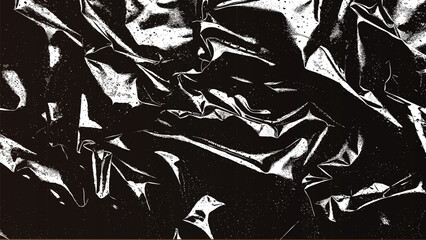 Naklejka premium Abstract black and white crumpled fabric with high contrast and dramatic shadows