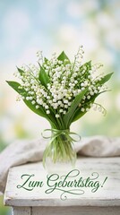 Lily of the valley bouquet arranged in glass vase on rustic wooden table