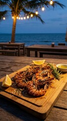 Grilled shrimp platter on wooden board by seaside table with evening lights