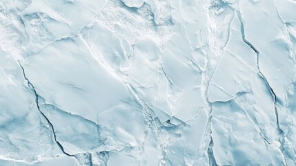 Fototapeta premium Abstract frozen ice surface with cracks and textures in cool blue tones