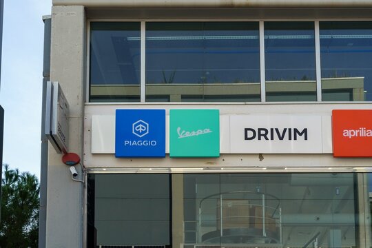 Barcelona, Spain-November 27, 2022. Facade and logo of Vespa, a brand of motorbikes belonging to the Piaggio group, first manufactured in Pontedera, Italy in 1946.