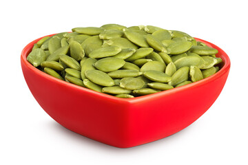 Peeled pumpkin seeds in ceramic bowl isolated on white background