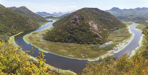 Horseshoe Bend of Rijeka Crnojevića River at Pavlova Strana Viewpoint, Montenegro Skadar Lake National Park Panorama © kulikovan