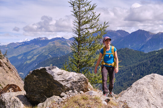 Woman hiking in the Italian Alps