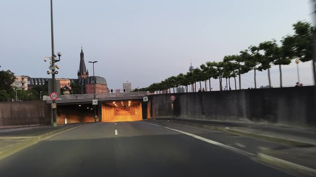 Drive pov in underground tunnel under Rhine promenade in Dusseldorf, Germany