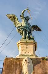 Obraz premium Angel statue on top of Castle of the Holy Angel in Rome, Italy